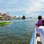 Destin's HarborWalk Village as seen from a Destin dolphin sightseeing cruise