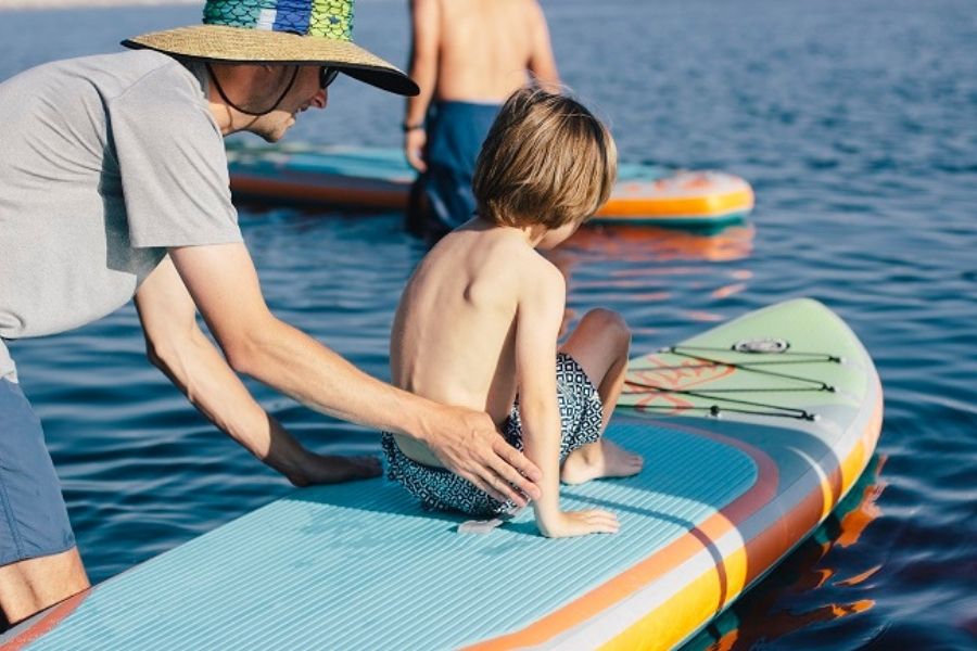 paddleboarding through Destin Harbor